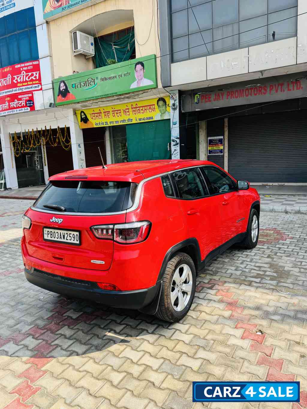 Exotic Red Jeep Compass LONGITUDE 2.0D