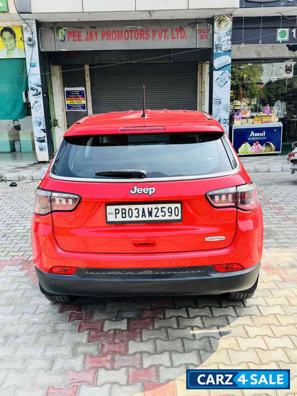 Exotic Red Jeep Compass LONGITUDE 2.0D