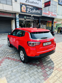 Exotic Red Jeep Compass LONGITUDE 2.0D