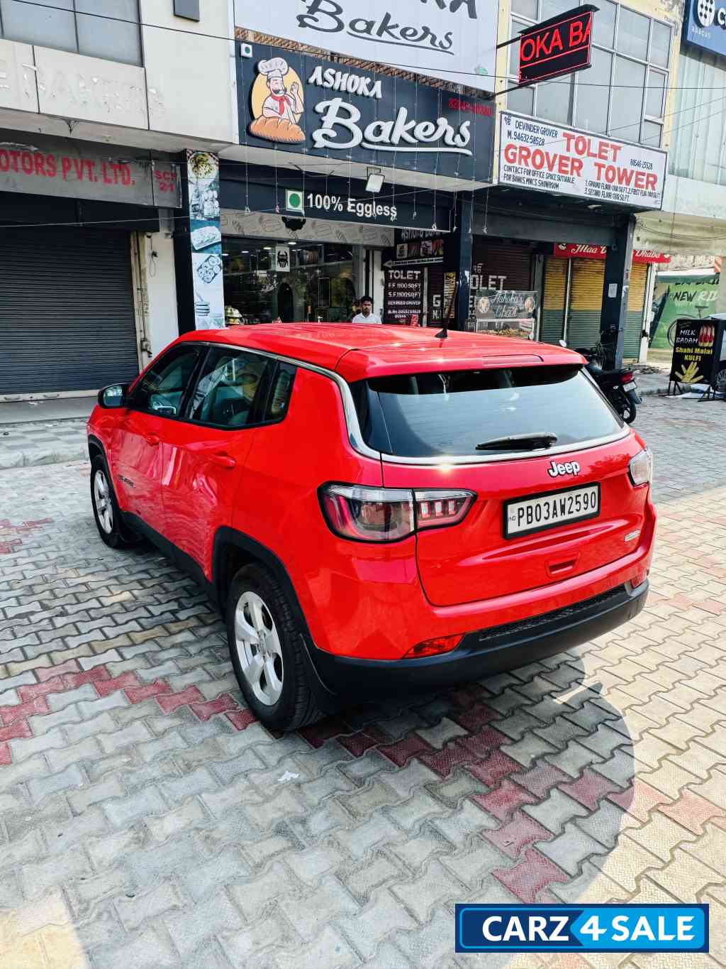 Exotic Red Jeep Compass LONGITUDE 2.0D