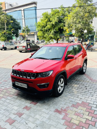 Exotic Red Jeep Compass LONGITUDE 2.0D
