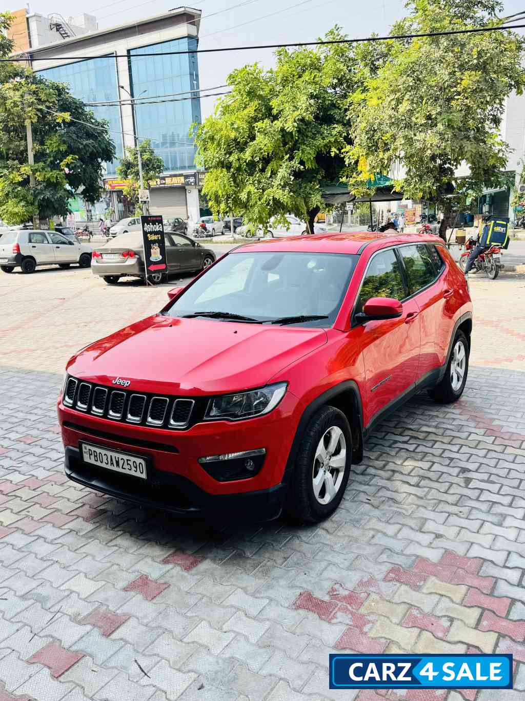 Exotic Red Jeep Compass LONGITUDE 2.0D