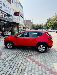 Exotic Red Jeep Compass LONGITUDE 2.0D