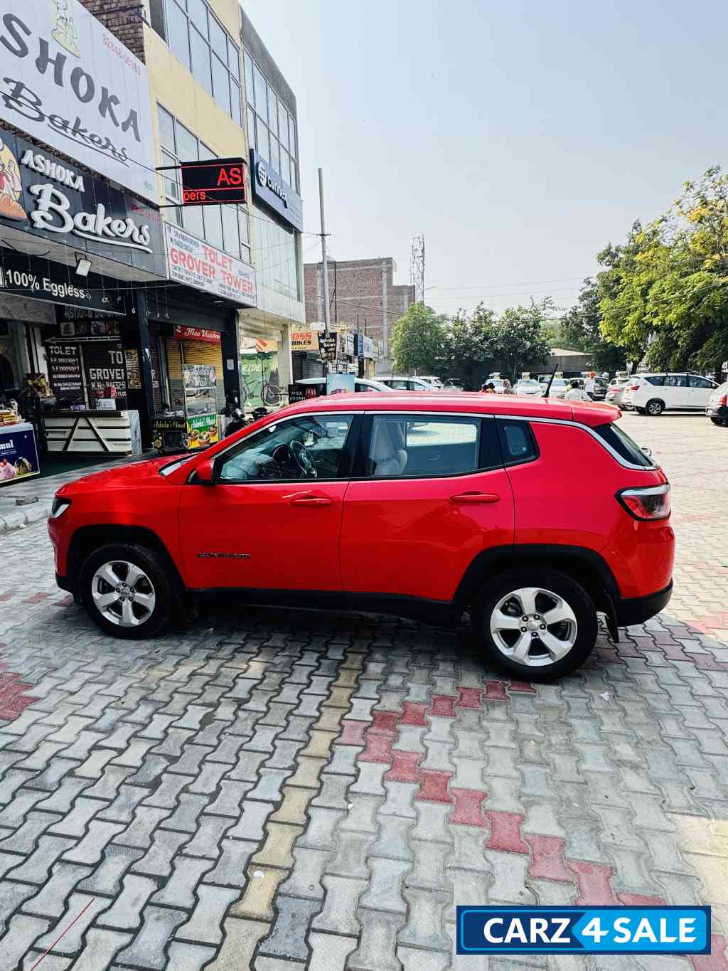 Exotic Red Jeep Compass LONGITUDE 2.0D
