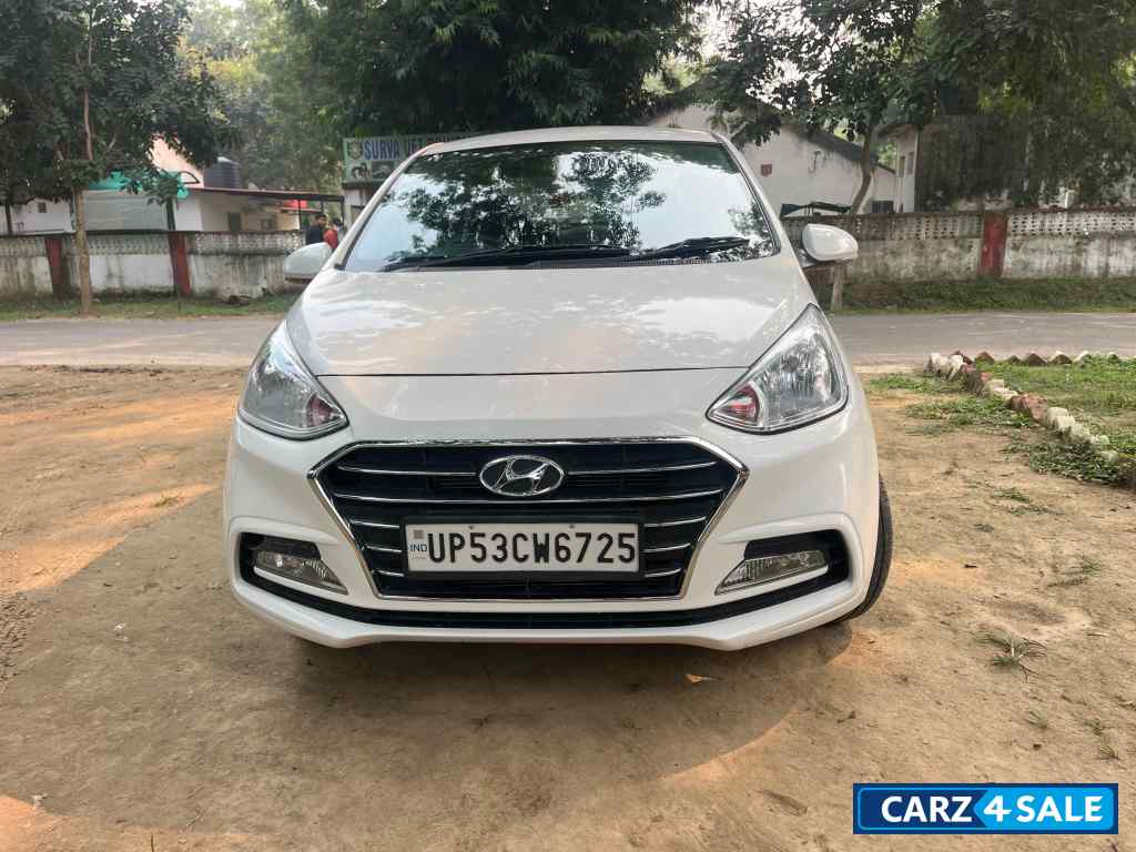 White Hyundai Xcent 1.2 vtvt