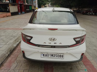 Pearl White Hyundai Aura 1.2 SX