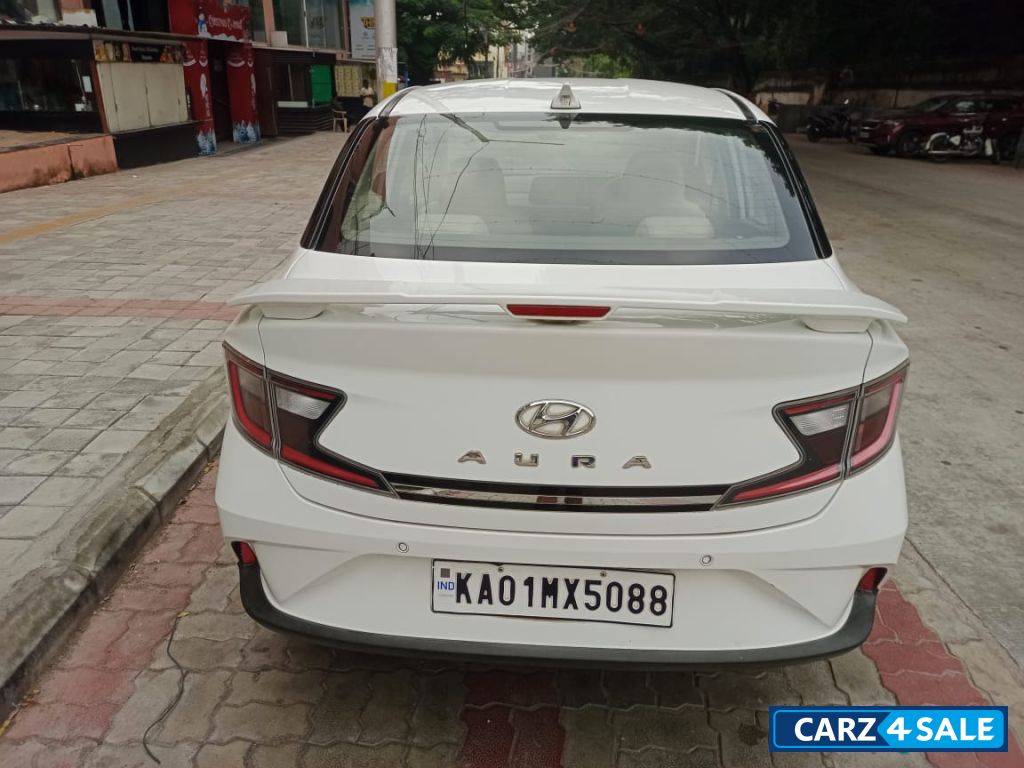Pearl White Hyundai Aura 1.2 SX