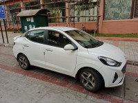 Pearl White Hyundai Aura 1.2 SX