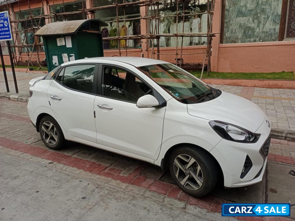 Pearl White Hyundai Aura 1.2 SX