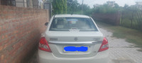 Pearl Arctic White Maruti Suzuki Dzire VDi