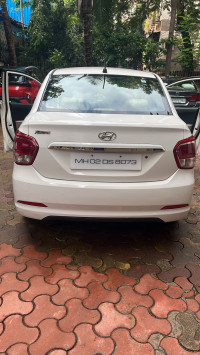 White Hyundai Xcent VTVT