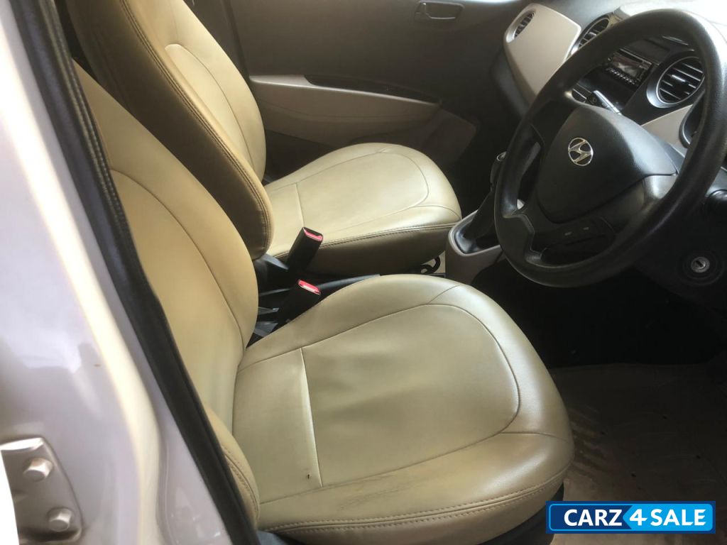 White Hyundai Xcent VTVT