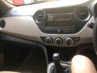 White Hyundai Xcent VTVT