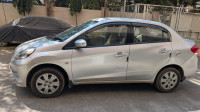 A Silver Honda Amaze S IV tec