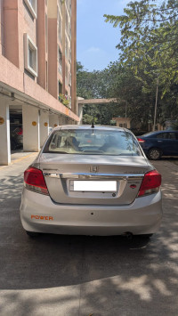 A Silver Honda Amaze S IV tec