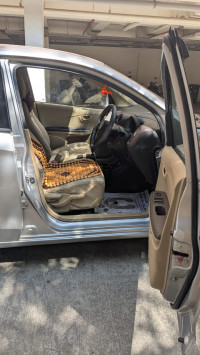 A Silver Honda Amaze S IV tec