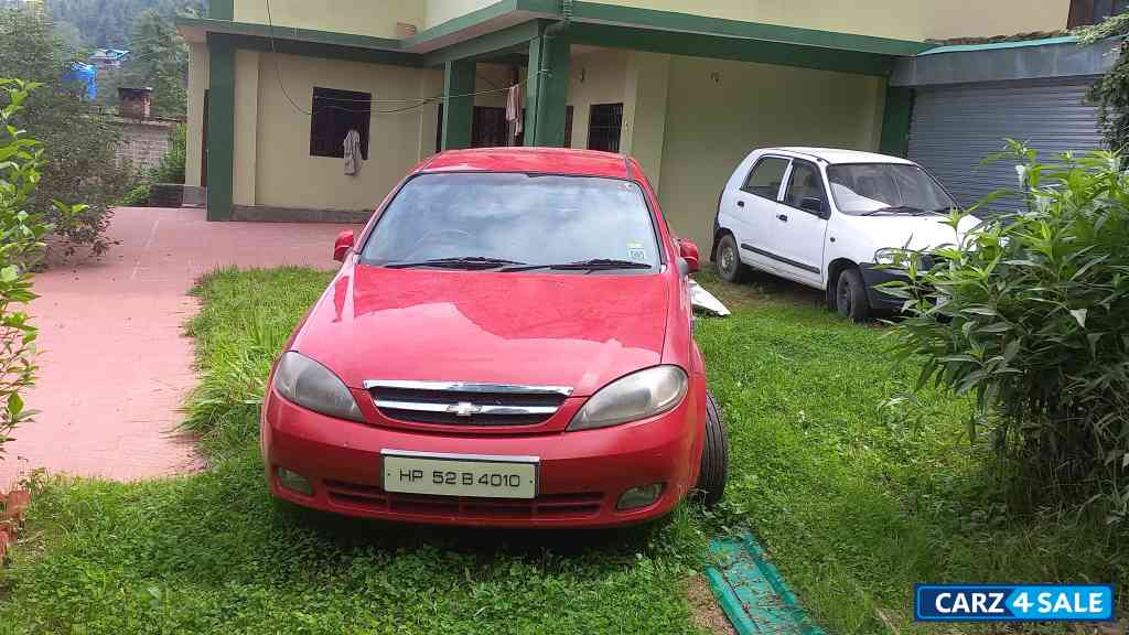 Red Chevrolet Optra 1.6