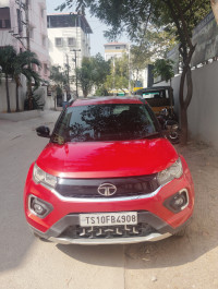 Orange Red Tata Nexon Xz plus