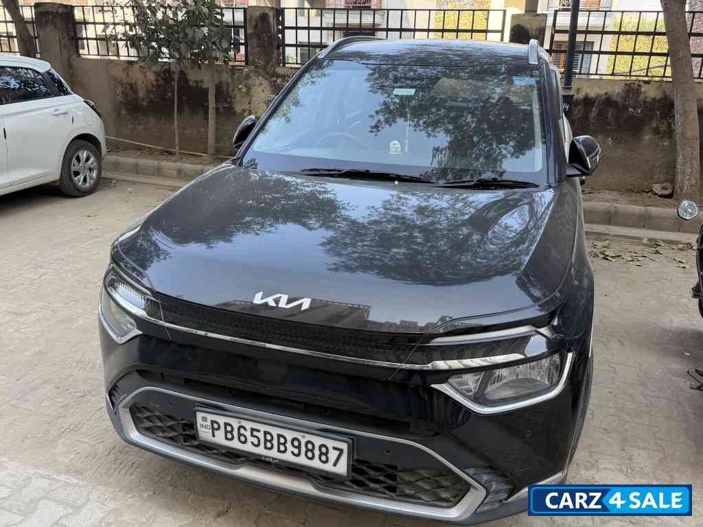 Black Kia Carens Prestige plus 1.4 turbo