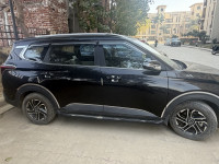 Black Kia Carens Prestige plus 1.4 turbo