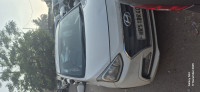 Polar White Hyundai Xcent E+
