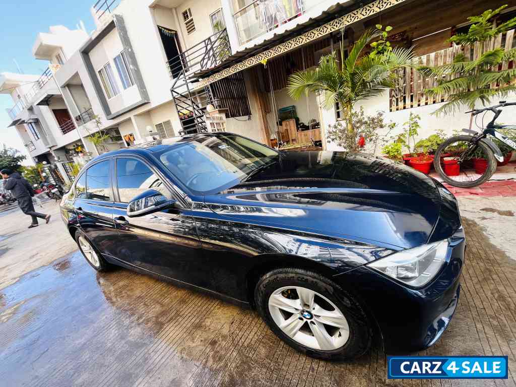 Blue BMW 3-Series Prestige 320 D