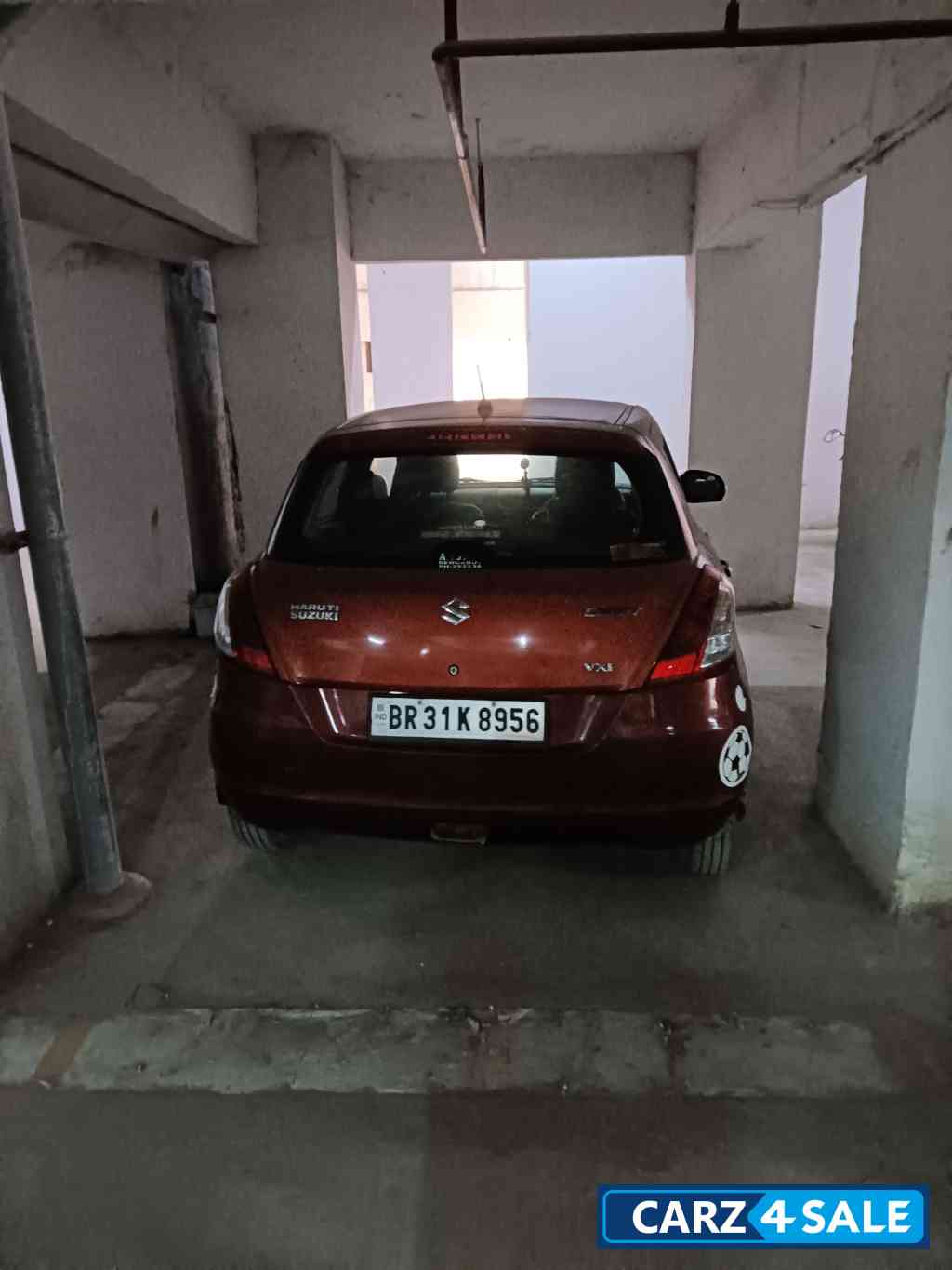 Blazed Red Maruti Suzuki Swift VXI