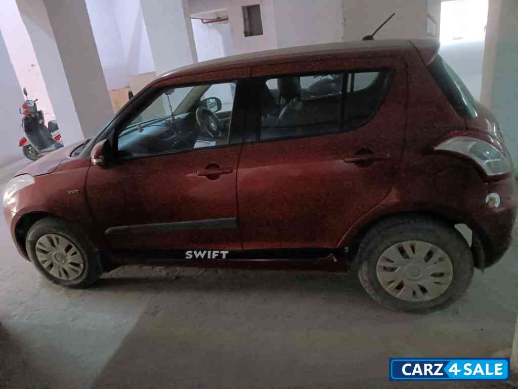 Blazed Red Maruti Suzuki Swift VXI