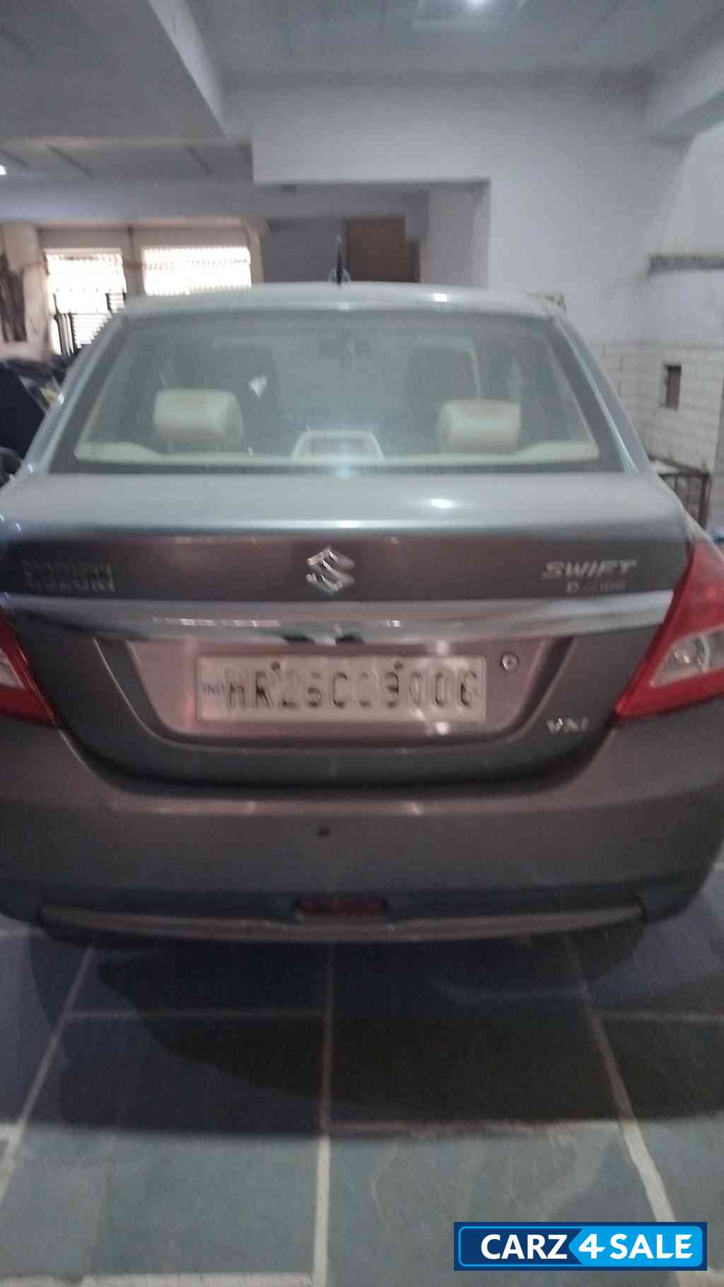 Gray Maruti Suzuki Swift Dezair vxi