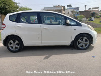 T. White Honda Jazz Top Model