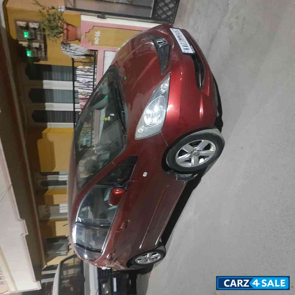 Red Honda Jazz IV-Tech