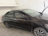Golden Brown Honda City 4th Generation V MT Petrol