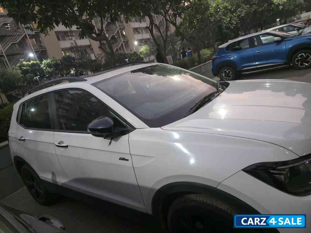 White Volkswagen Taigun TSI