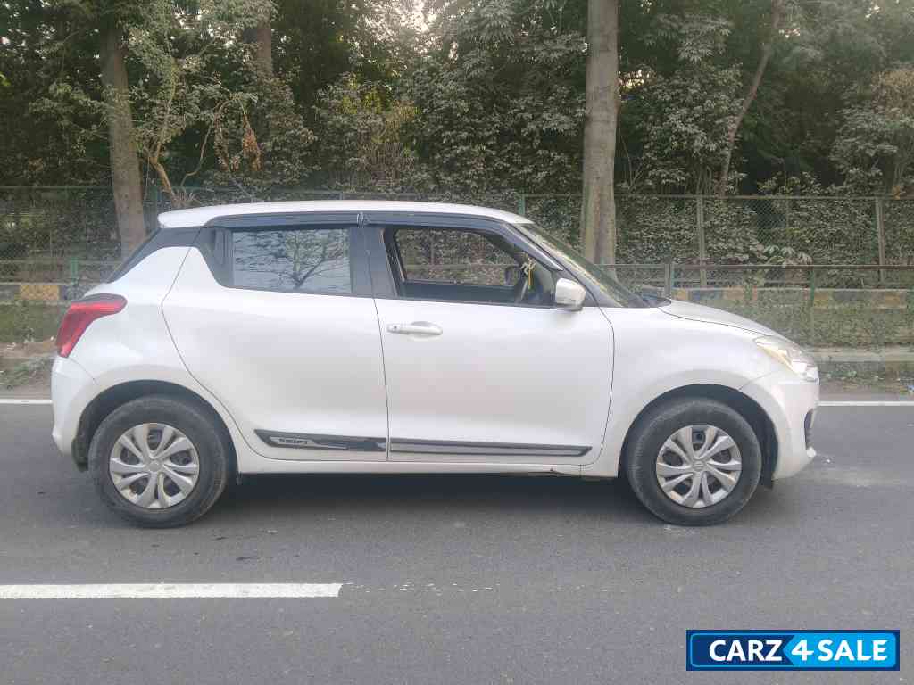 Pearl Artic White Maruti Suzuki Swift VXI