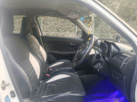Pearl Artic White Maruti Suzuki Swift VXI