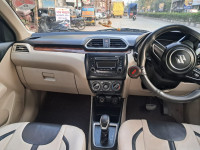 Silver Grey Maruti Suzuki Swift Dezire AT