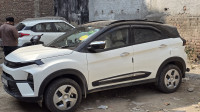 White Tata Nexon Smart Plus icng
