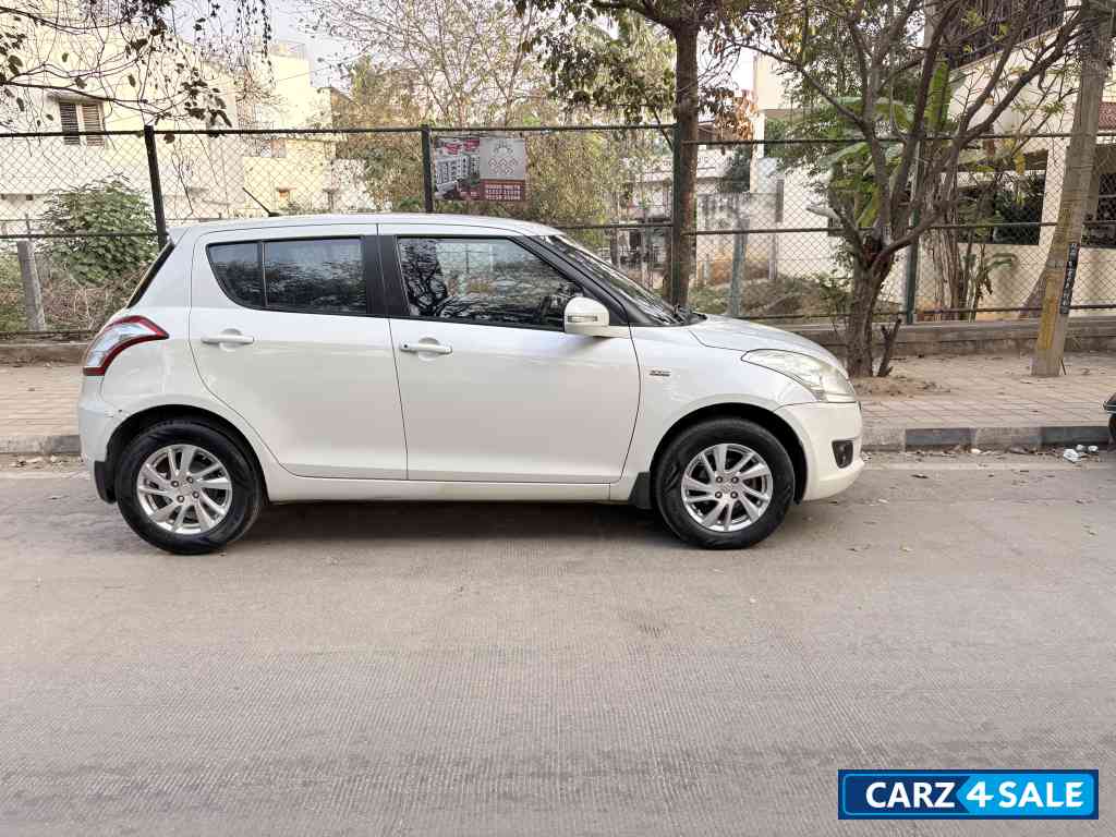 Pearl White Maruti Suzuki Swift VDI