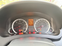 Pearl White Maruti Suzuki Swift VDI