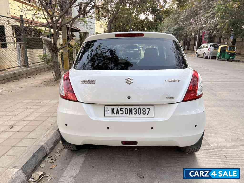 Pearl White Maruti Suzuki Swift VDI