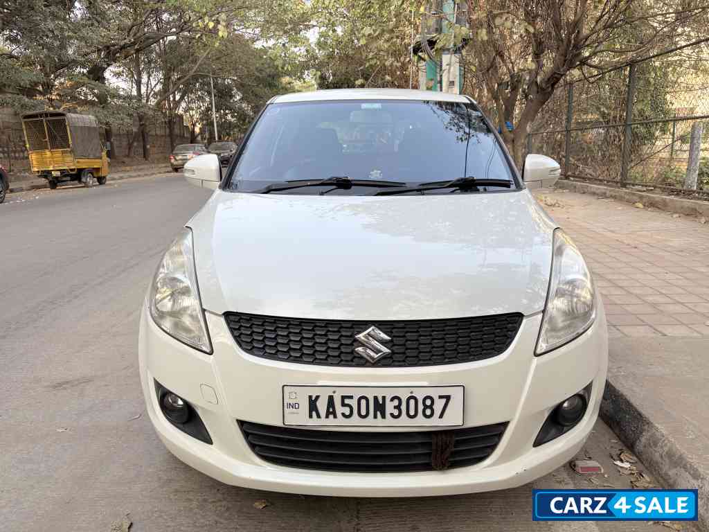 Pearl White Maruti Suzuki Swift VDI