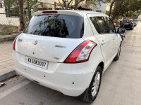 Pearl White Maruti Suzuki Swift VDI