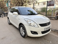 Pearl White Maruti Suzuki Swift VDI