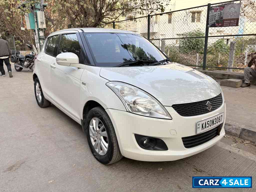 Pearl White Maruti Suzuki Swift VDI