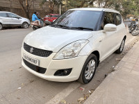 Pearl White Maruti Suzuki Swift VDI