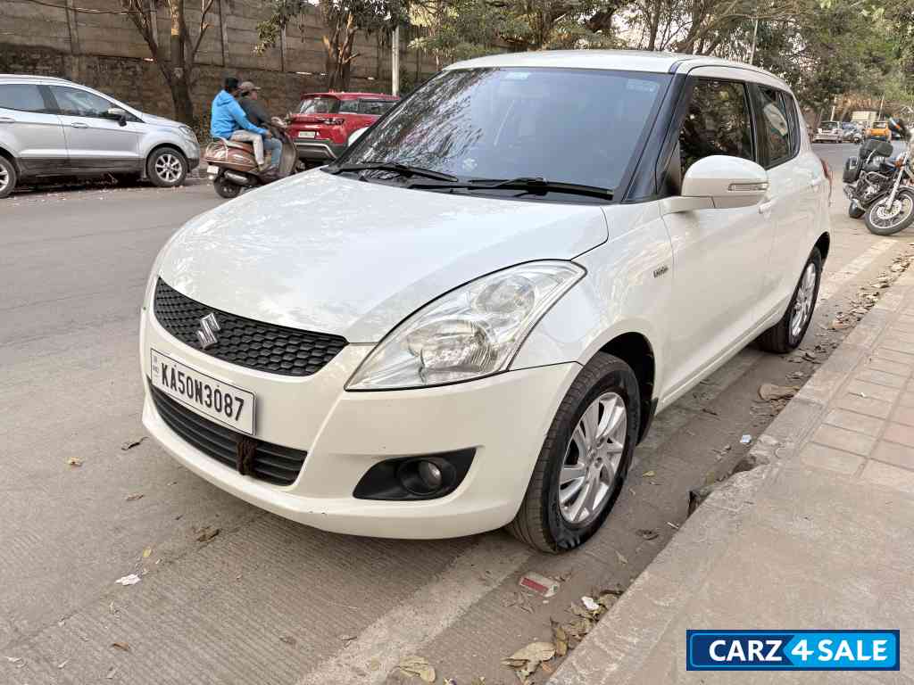 Pearl White Maruti Suzuki Swift VDI