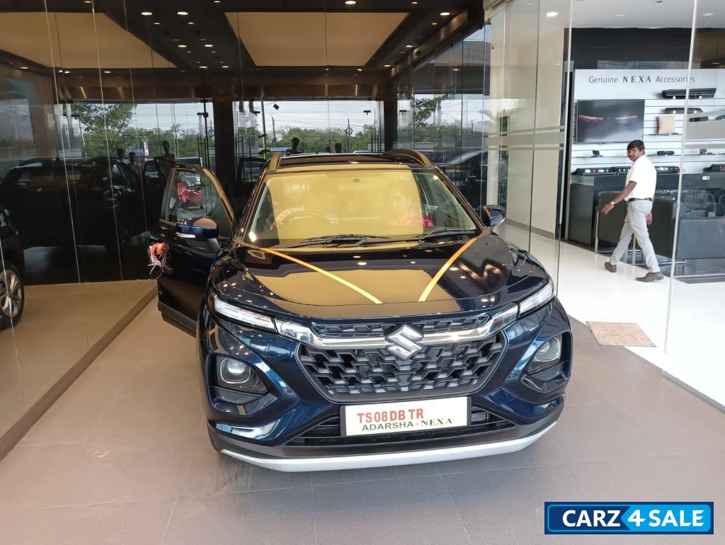 Blue Maruti Suzuki Fronx delta automatic