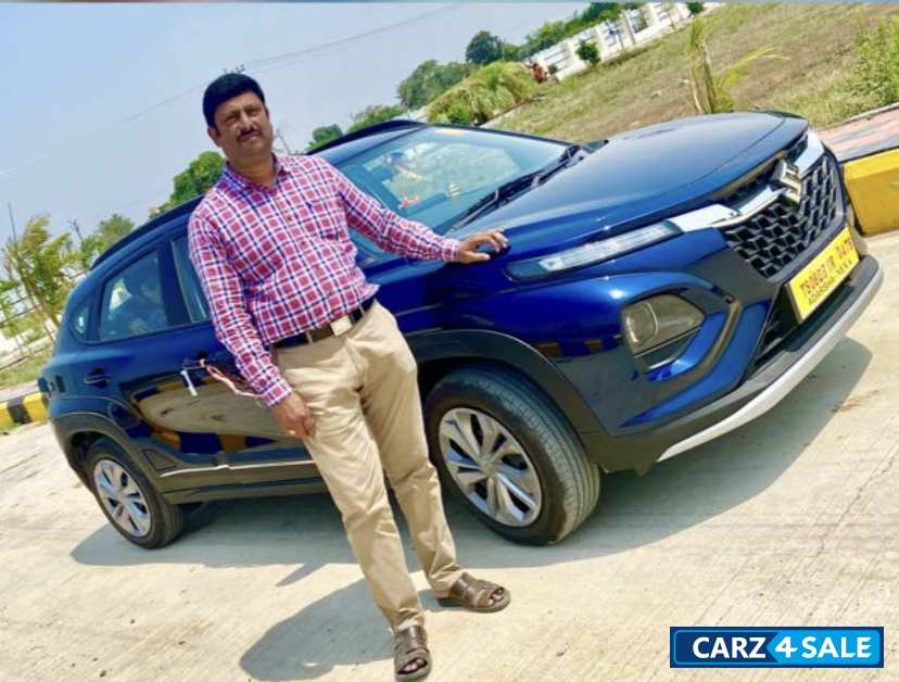 Blue Maruti Suzuki Fronx delta automatic