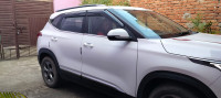 White Pearl Kia Seltos HTK PLUS