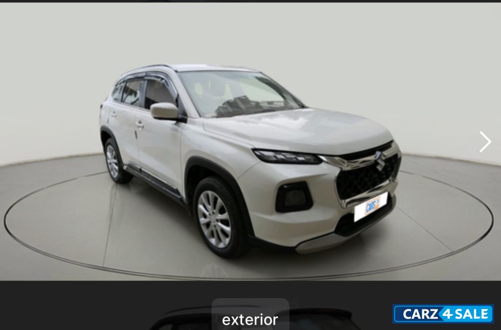 White Maruti Suzuki Grand Vitara Sigma